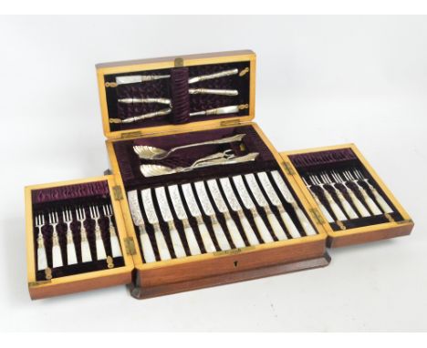 A c.1880s mahogany and burr walnut cased electroplated bladed and mother of pearl handled set of twelve dessert knives and fo