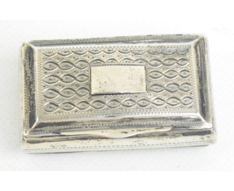 A George IV hallmarked silver snuff box of rectangular form with pin pricket decoration to the sides, base and hinged lid cen