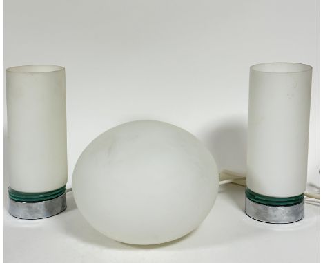 A pair of John Lewis chromium and clear glass based opaque glass column lamps, with modern fitted plugs (26cm x d.10cm) and a