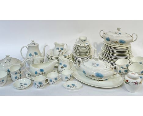 A Wedgewood Ice Rose pattern part dinner service comprising a teapot (h-16cm w-26cm), a coffee pot (h-21cm), a sauce boat and