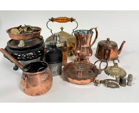 A collection of 19thc and later copper and brassware including a Victorian brass tea kettle with amber glass handle, a collec