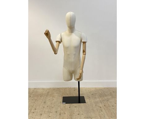 Shop fitting, A contemporary male torso mannequin, white cotton covered head and torso, with articulated neck, arm and finger
