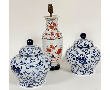 A pair of Chinese porcelain baluster ginger jars and covers with allover scrolling crysanthemum leaf decoration (26cm x d.22c