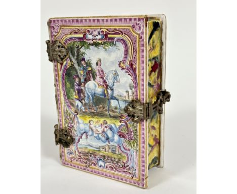 An early 19thc French faience pottery box in the form of a hinged book, the cover with cast white metal acanthus leaf mounts 
