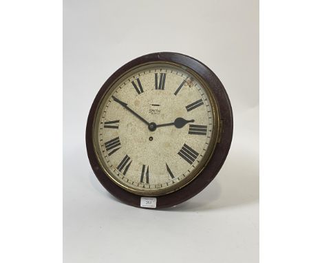A Smith bakerlight, brass and treen wall clock, first half of the 20th century, white painted dial with Roman chapter ring, e