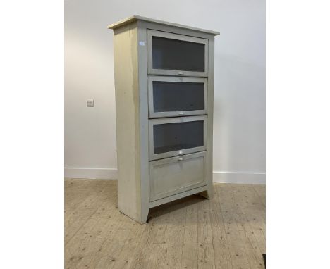 A 1950's style painted pine meat safe, with three up and over doors over a fall front door, raised on panel end supports H78c