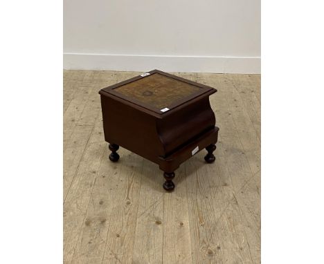 A Victorian mahogany night commode, the hinged top opening to a ceramic bowl, raised on turned supports, H42cm, W44cm D45cm