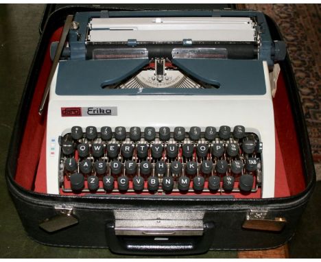 A 1970's Daro Erika model 42 typewriter, no.433819, made in the German Democratic Replublic
Blue and pearl casing with some w