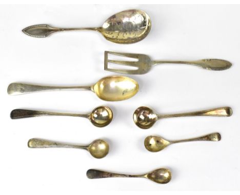 Various small items of hallmarked silver to include a sugar sifter spoon, various small forks, salt spoon, snuff spoon, musta