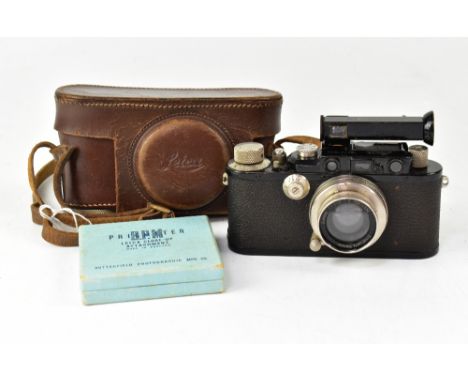 A 1933 Leica III film camera serial no.121650, fitted with a light Summar f=5cm 1:2 lens together with leather case, a Leica 