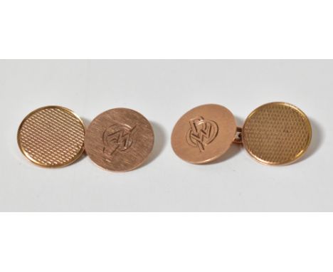 A pair of vintage 9ct gold circular cufflinks, one side with engine turned decoration, the other plain, with initials 'OWP', 
