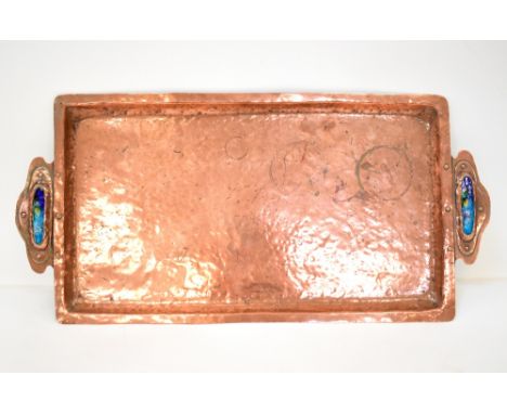 An Arts and Crafts copper rectangular tray with blue and green enamel panels to the shaped handles and riveted joints, unmark