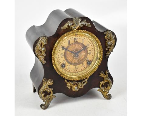 ANSONIA: an early 20th century metal cased and faux wood design eight day mantel clock in the Rococo style, the painted and g