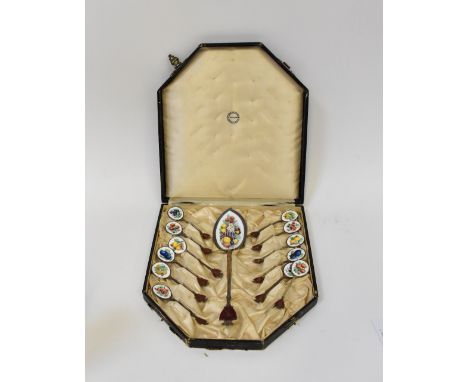 DAVID ANDERSEN, CHRISTIANIA; a set of twelve Danish silver (925) fruit spoons and large serving spoon, each bowl with a print
