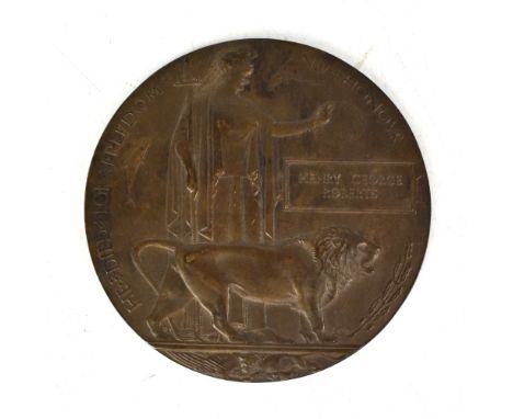 A WWI bronze commemorative plaque relating to Henry George Roberts. 