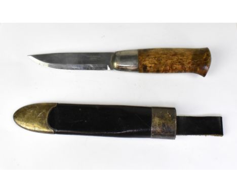 DAVID ANDERSEN, NORWAY; a Peer Gynt Kniven (Viking knife) with stainless steel blade, wooden handle, and leather scabbard wit