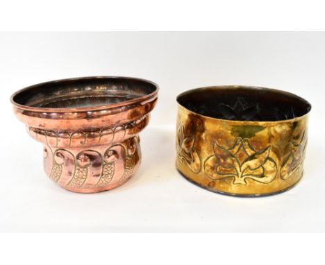 An Arts and Crafts brass planter with repoussé floral decoration, diameter 25cm, and a further Arts and Crafts style planter,