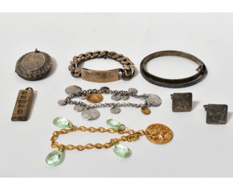 A small quantity of silver jewellery to include a heavy curb link identity bracelet inscribed 'G.E.K.' with Masonic set squar