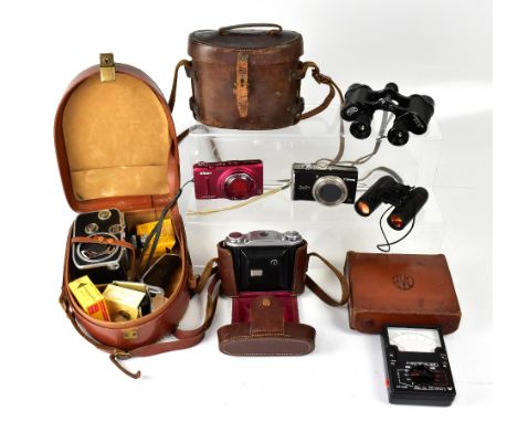 A collection of cameras and binoculars to include an Ensign Selfix 16-20 camera, a Paillard C8 super 8 camera, a pair of Carl