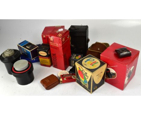 A collection of cameras and darkroom equipment to include a Coronet Flash Master, a Cartridge Hawk Eye Model B box camera, a 