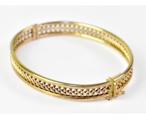 A 9ct yellow gold lattice bangle, approx 9.8g