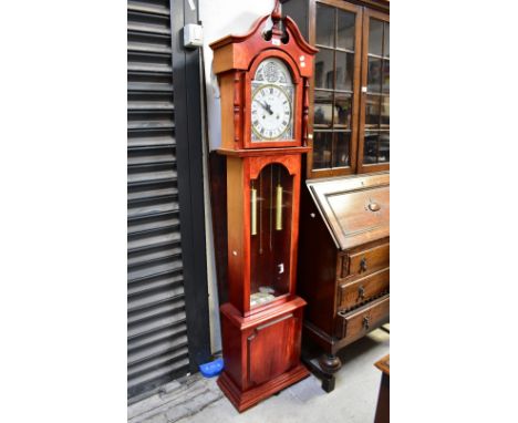 A 20th century oak cased chiming grandmother clock, with brass dial and chapter ring, spandrels and disc inscribed 'Tempus Fu