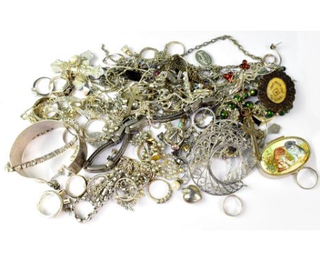 A quantity of silver and white metal jewellery including chain, pendants, a hallmarked silver three bar gate bracelet, silver