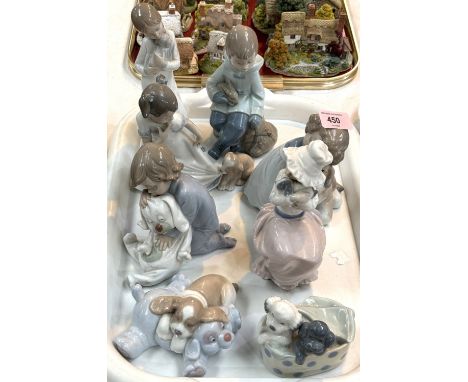 8 Nao figures including children and animals
