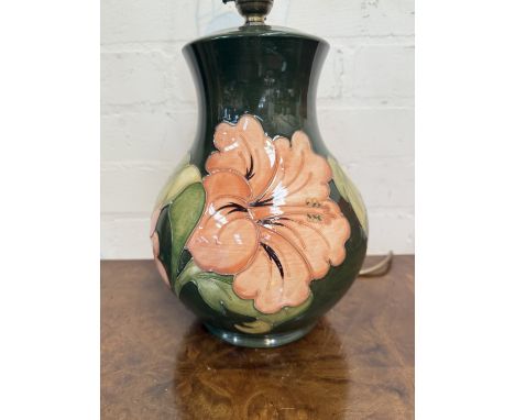 A Moorcroft Hibiscus table lamp and shade.