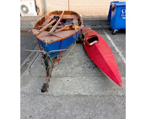 A Kayak and a vintage wooden sailing dinghy with oars and accessories, on trailer (from a local deceased estate, condition as