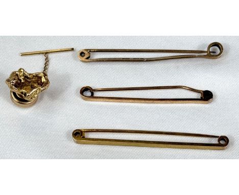 Three 9ct tie clips; a 9ct tie pin formed from a nugget, 6.6gm.