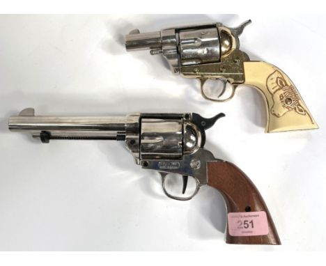 Two model revolvers one with cattle grip