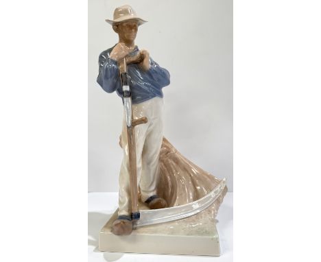 A Royal Copenhagen porcelain figure man with scythe 26cm