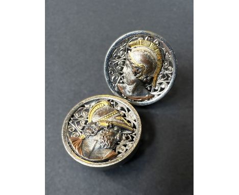 A pair of white metal Grand Tour style cufflinks, each set with classical helmeted head.