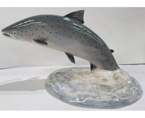 A Royal Copenhagen porcelain figure of a leaping salmon 31cm No 5456 (seconds).Condition report: Overall good condition, four