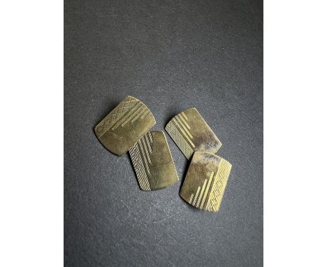 A pair of engine turned 9ct hallmarked gold cufflinks, 4.3gm.