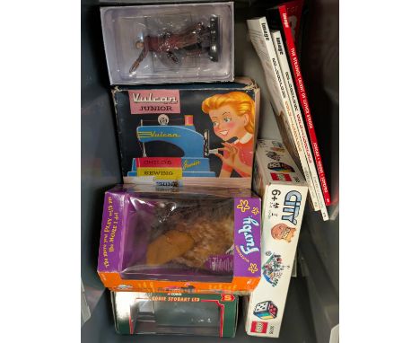 A vintage Vulcan junior boxed sewing machine, Black Science and Luther Strode graphic novels etc