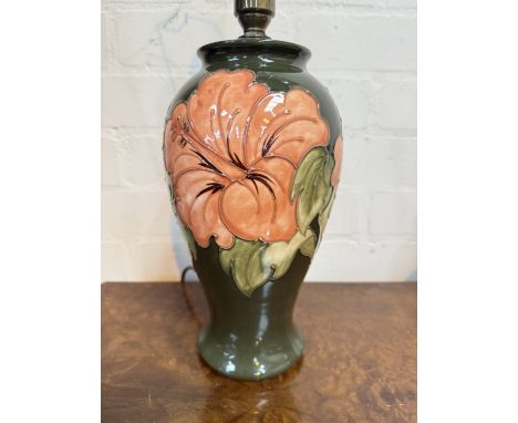 A Moorcroft Hibiscus table lamp and shade.