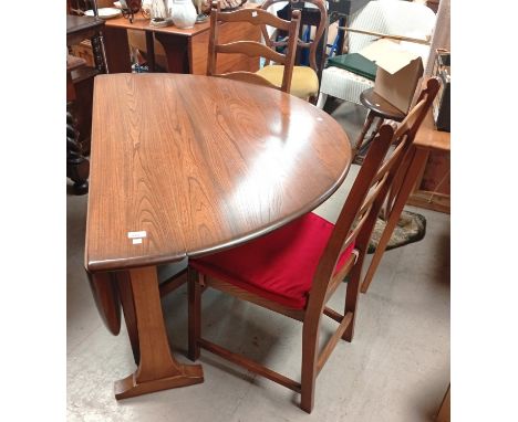 A modern Ercol medium elm dining suite comprising oval drop-leaf dining table, four ladder-back chairs