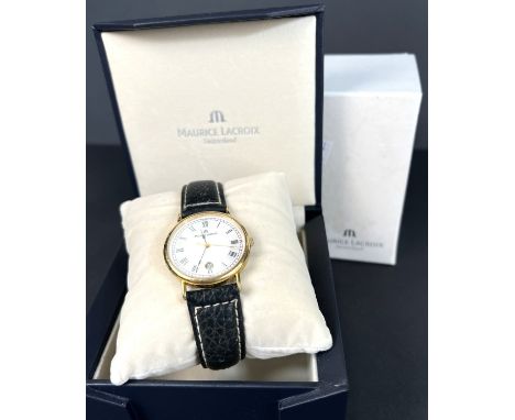 A Maurice Lacroix gent's wristwatch, black Roman numerals, gilt seconds sweep and date aperture, case no. 69686, on leather s