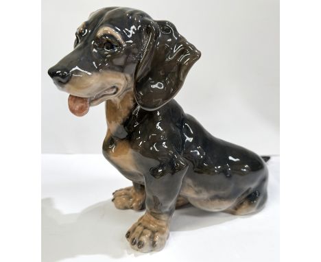 A Royal Copenhagen porcelain figure of a Dachshund No 856 19cm