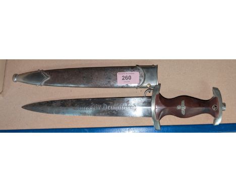 A WWII German dagger, NSKK, in steel scabbard with eagle mounts SA, with etched blade S14/4860m Kuno Ritter, Solingen.