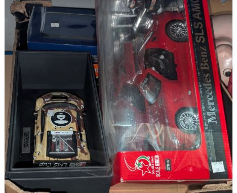 Three originally boxed scale model racing/sports cars.