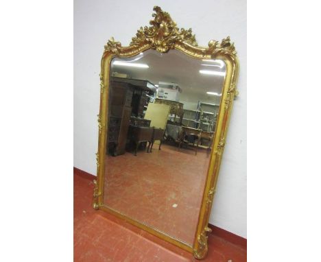 A Victorian Gilt Carved, Wood Rococo Over Mantel Mirror with Serpentine Shaped Pediment. Size (W) 3'2" (97cm) x (H) 5'1" (1.5