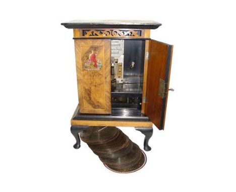 A Britannia manual 9-inch upright disc musical box, Alexandra Model, Ser. No. 5131, with twin combs on reeded cast silvered t