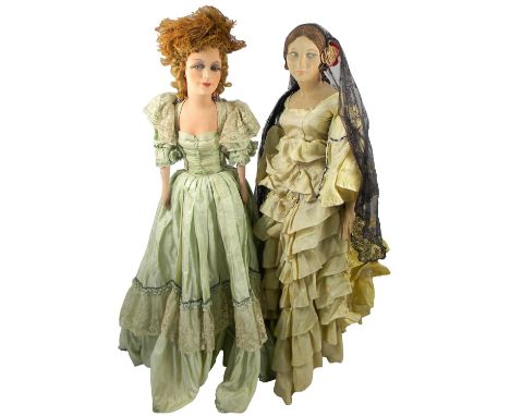 Two large Boudoir dolls, 1920s, the first with stockinette head, painted side-glancing eyes with upper lashes, brows and mout