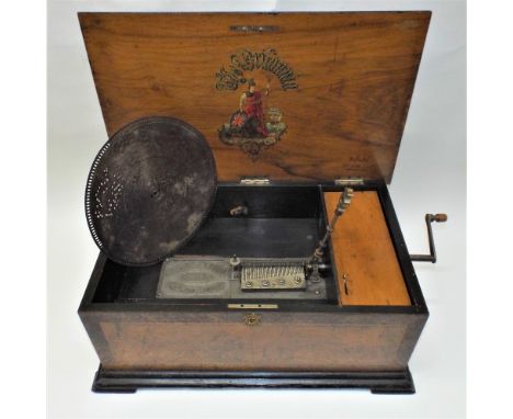 A Britannia Imperial 11.3/4-inch table disc musical box, by B.H.A.,Ser. No. 195, stamped single comb, title cast bedplate, eb