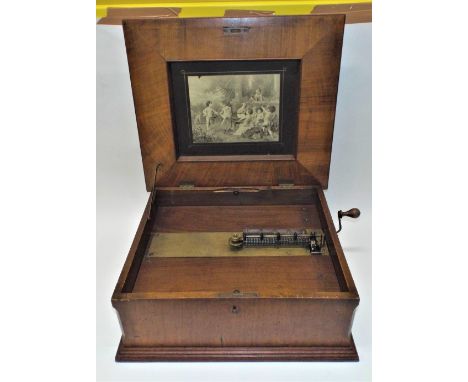 A Polyphon 15.1/2-inch disc musical box,Style 43D, Ser. No. 42980, with single comb, reeded cast bedplate, Putti-in-garden li