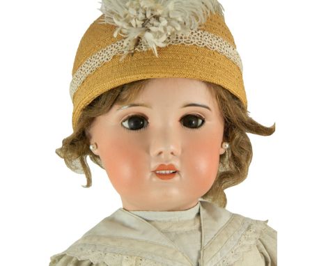 Large S.F.B.J ‘Jumeau’ type bisque head doll, French circa 1905, with weighted brown glass eyes, lashes, open mouth with uppe