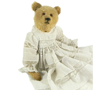 Golden mohair Steiff Teddy bear, German 1920s, straw filled bear with small hump to back and long arms with large feet, swive